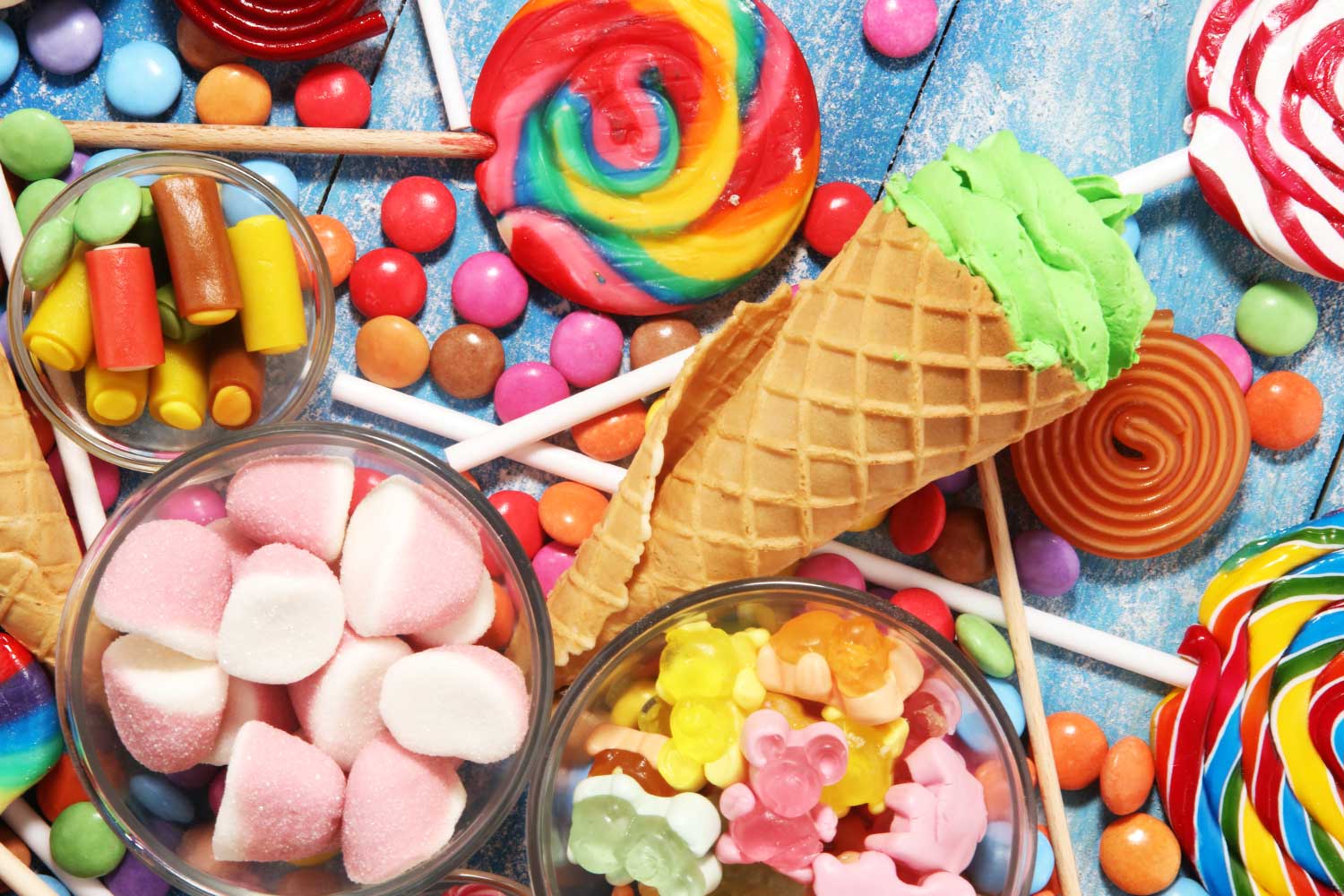 A tabletop of assorted candy and sweet treats.