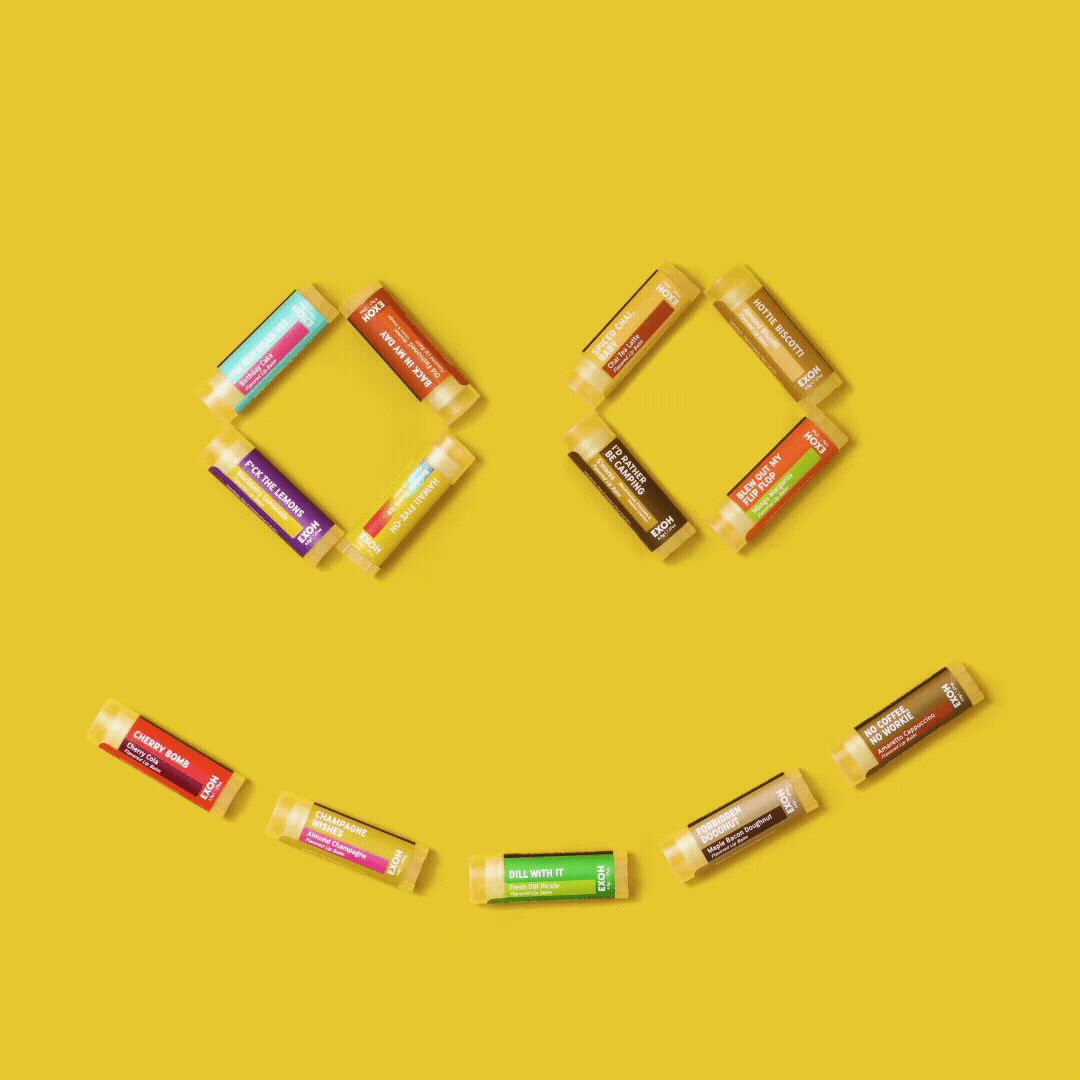 Animated gif of the EXOH smiley icon created out of lip balms, winking.