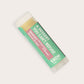 Product photo of spumoni flavored lip balm "A Dessert You Can't Refuse" by EXOH on grey background.