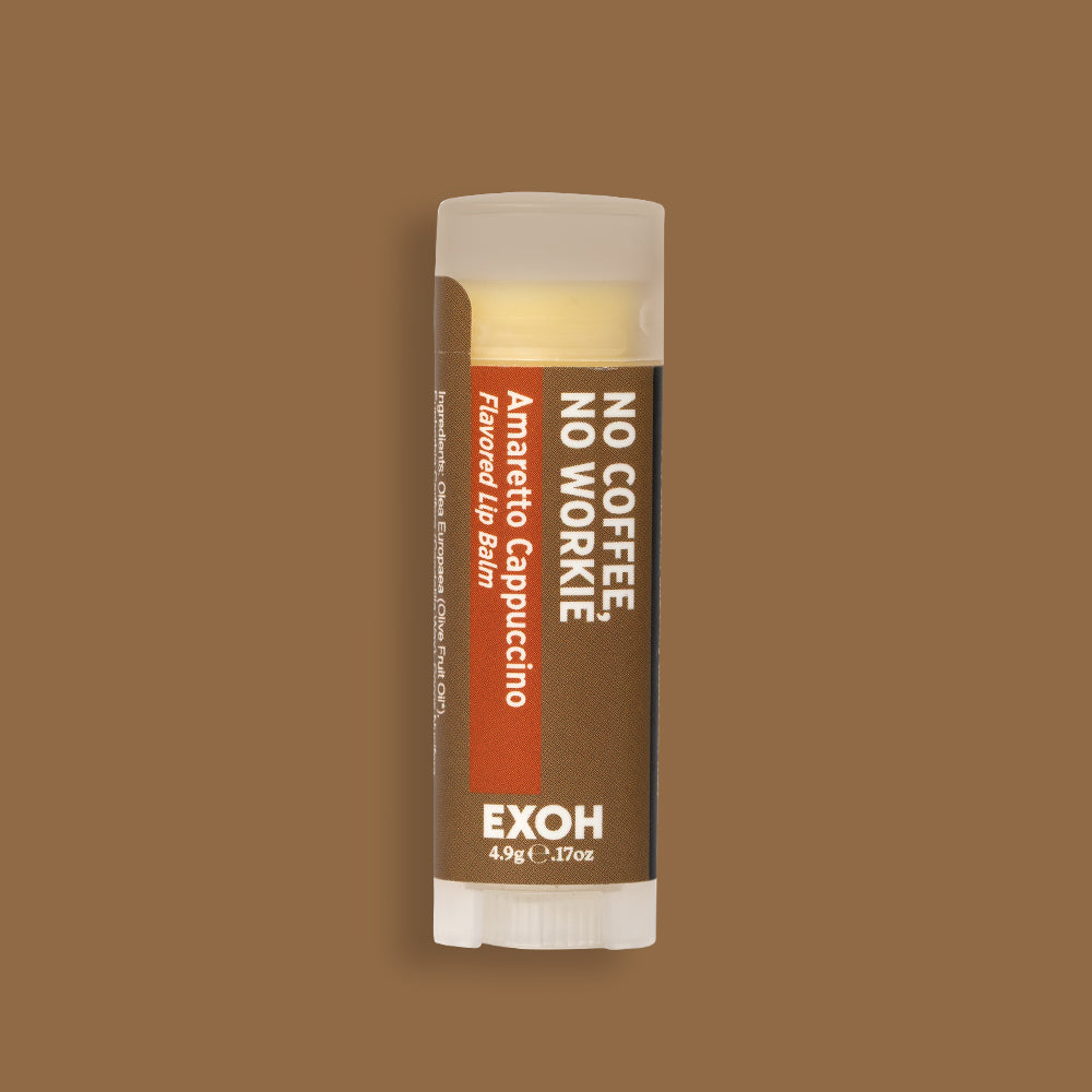 Product photo of amaretto cappuccino flavored lip balm "No Coffee, No Workie" by EXOH on light coffee brown background.